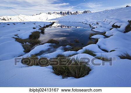 Kalkkoegel Range reflected in the water, Salfains, Tyrol, Austria, Europe View Large Photo Image Stock Photo - Kalkkoegel Range reflected in the water, Salfains, Tyrol, Austria, Europe. Fotosearch