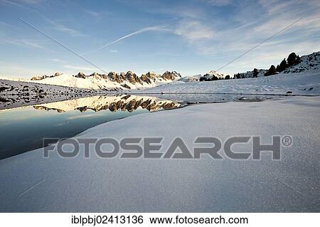 Kalkkoegel Range reflected in the water, Salfains, Tyrol, Austria, Europe View Large Photo Image Stock Photograph - Kalkkoegel Range reflected in the water, Salfains, Tyrol, Austria, Europe. Fotosearch