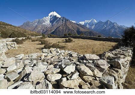 "Kangtega Mountain, seen from above Namche Bazar (3. 440 m), the base for trekking and mountaineering in Solo Khumbu region, Namche Bazar, Solukhumbu District, Sagarmatha Zone, Nepal, Asia" View Large Photo Image Picture - "Kangtega Mountain, seen from above Namche Bazar (3. 440 m), the base for trekking and mountaineering in Solo Khumbu region, Namche Bazar, Solukhumbu District, Sagarmatha Zone, Nepal, Asia". Fotosearch