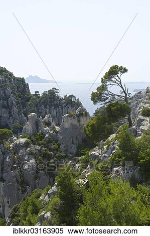 "Karst rocks in the rocky bay Calanque d'En-Vau, Calanques National Park, Cassis, Departement Bouches-du-Rhone, Region Provence-Alpes-Cote d? ÇÖAzur d? ÇÖAzur, France, Europe" View Large Photo Image Stock Photography - "Karst rocks in the rocky bay Calanque d'En-Vau, Calanques National Park, Cassis, Departement Bouches-du-Rhone, Region Provence-Alpes-Cote d? ÇÖAzur d? ÇÖAzur, France, Europe". Fotosearch