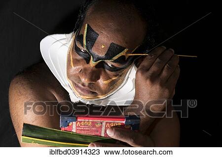 "Katakali artist applying the makeup of the Shiva character, Varkala, Kerala, India, Asia" View Large Photo Image Stock Image - "Katakali artist applying the makeup of the Shiva character, Varkala, Kerala, India, Asia". Fotosearch
