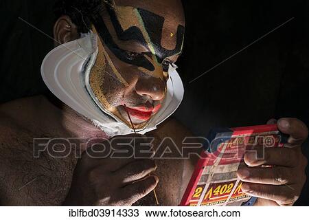 "Katakali artist applying the makeup of the Shiva character, Varkala, Kerala, India, Asia" View Large Photo Image Stock Image - "Katakali artist applying the makeup of the Shiva character, Varkala, Kerala, India, Asia". Fotosearch