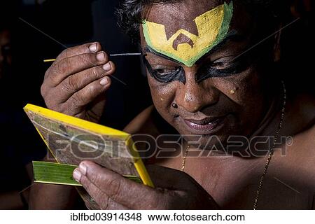 "Katakali artist applying the makeup of the Deshen character, Varkala, Kerala, India, Asia" View Large Photo Image Stock Photo - "Katakali artist applying the makeup of the Deshen character, Varkala, Kerala, India, Asia". Fotosearch