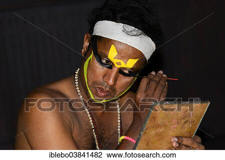 "Kathakali dancer applying makeup in preparation for his performance, Kochi, Kerala, South India, India, Asia" View Large Photo Image Stock Image - "Kathakali dancer applying makeup in preparation for his performance, Kochi, Kerala, South India, India, Asia". Fotosearch