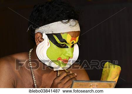 "Kathakali dancer applying makeup in preparation for his performance, Kochi, Kerala, South India, India, Asia" View Large Photo Image Stock Photo - "Kathakali dancer applying makeup in preparation for his performance, Kochi, Kerala, South India, India, Asia". Fotosearch