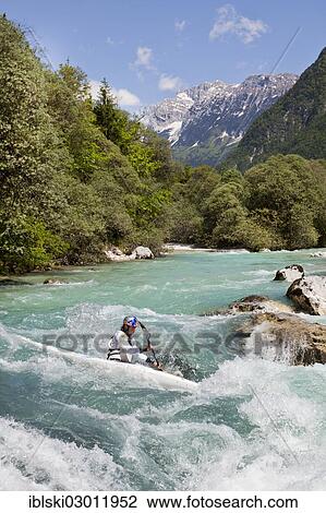 "Kayaker on the Soca River in the Soca Valley in Triglav National Park, Julian Alps, near Bovec, Slovenia, Europe" View Large Photo Image Stock Image - "Kayaker on the Soca River in the Soca Valley in Triglav National Park, Julian Alps, near Bovec, Slovenia, Europe". Fotosearch