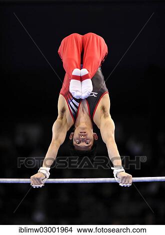 "Kazuhito Tanaka, JPN, performing on the high bar, EnBW Gymnastics World Cup, 2012, Men, Porsche-Arena, Stuttgart, Baden-Wurttemberg, Germany, Europe" View Large Photo Image Picture - "Kazuhito Tanaka, JPN, performing on the high bar, EnBW Gymnastics World Cup, 2012, Men, Porsche-Arena, Stuttgart, Baden-Wurttemberg, Germany, Europe". Fotosearch