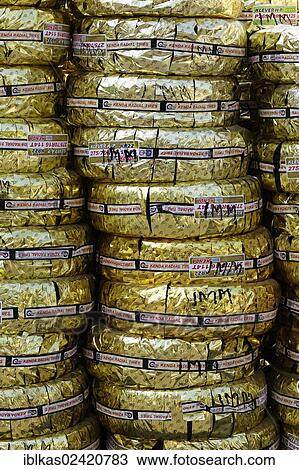 Kenda off-road tyres wrapped in gold foil, packed for loading on Dubai Creek, Dubai, United Arab Emirates, Middle East, Asia View Large Photo Image Stock Image - Kenda off-road tyres wrapped in gold foil, packed for loading on Dubai Creek, Dubai, United Arab Emirates, Middle East, Asia. Fotosearch