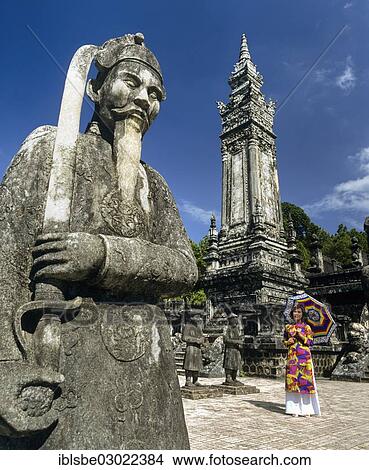 "Khai Dinh Tomb, Mandarin soldiers made of stone, samurai statue, obelisk, woman wearing a colourful traditional costume, Hue, Provinz Thua Thien-Hue, Vietnam, Asia" View Large Photo Image Picture - "Khai Dinh Tomb, Mandarin soldiers made of stone, samurai statue, obelisk, woman wearing a colourful traditional costume, Hue, Provinz Thua Thien-Hue, Vietnam, Asia". Fotosearch
