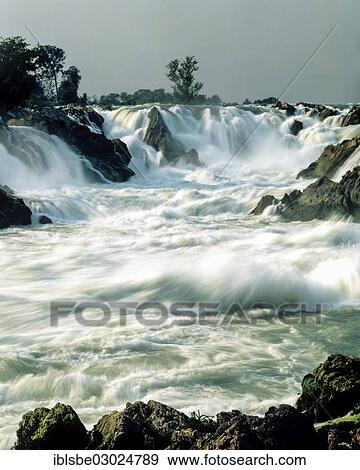 Stock Photo - "Khong Phapheng falls, waterfalls on the Mekong River, Si Phan Don, Laos, Asia". Fotosearch