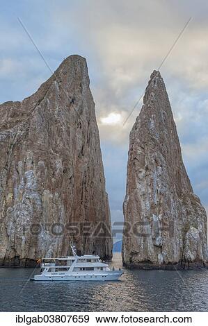 "Kicker Rock or Roca Leon Dormido, San Cristobal Island, Galapagos Islands, Ecuador, South America" View Large Photo Image Stock Photo - "Kicker Rock or Roca Leon Dormido, San Cristobal Island, Galapagos Islands, Ecuador, South America". Fotosearch
