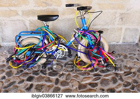 "Kid's bike with many locks, Annecy, Haute-Savoie, Rhone-Alpes region, France, Europe" View Large Photo Image Stock Photo - "Kid's bike with many locks, Annecy, Haute-Savoie, Rhone-Alpes region, France, Europe". Fotosearch