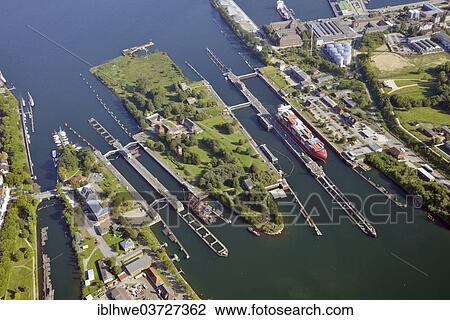"Kiel-Holtenau canal locks, northern end of the Kiel Canal, Nord-Ostsee-Kanal, aerial view, Kiel, Schleswig-Holstein, Germany, Europe" View Large Photo Image Stock Image - "Kiel-Holtenau canal locks, northern end of the Kiel Canal, Nord-Ostsee-Kanal, aerial view, Kiel, Schleswig-Holstein, Germany, Europe". Fotosearch