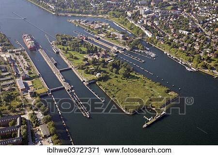 "Kiel-Holtenau canal locks, northern end of the Kiel Canal, Nord-Ostsee-Kanal, aerial view, Kiel, Schleswig-Holstein, Germany, Europe" View Large Photo Image Stock Image - "Kiel-Holtenau canal locks, northern end of the Kiel Canal, Nord-Ostsee-Kanal, aerial view, Kiel, Schleswig-Holstein, Germany, Europe". Fotosearch