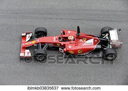 Stock Photo - "Kimi Raikkonen in the Ferrari F14 T, Formula 1 winter testing at the Circuito de Velocidad, Jerez de la Frontera, Andalusia, Spain, Europe". Fotosearch