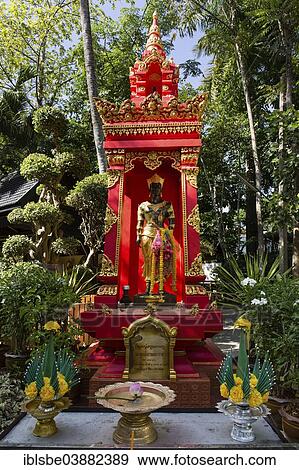 Stock Photo - "King Mangrai statue in a shrine in the garden of Wat Phra Kaeo, Meng Rai, Wat Phra Kaew, Chiang Rai, Chiang Rai province, Northern Thailand, Thailand, Asia". Fotosearch