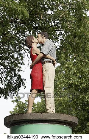 "Kissing couple, sculpture on an advertising column, Dusseldorf, Rhineland, North Rhine-Westphalia, Germany, Europe" View Large Photo Image Stock Image - "Kissing couple, sculpture on an advertising column, Dusseldorf, Rhineland, North Rhine-Westphalia, Germany, Europe". Fotosearch