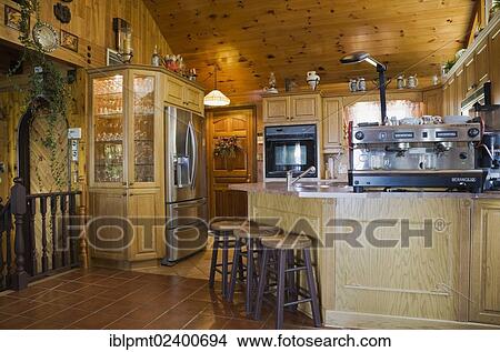 "Kitchen inside a Timber Frame residential home, Quebec, Canada, North America" View Large Photo Image Picture - "Kitchen inside a Timber Frame residential home, Quebec, Canada, North America". Fotosearch