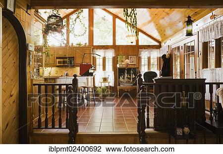 Stock Image - "Kitchen inside a Timber Frame residential home, Quebec, Canada, North America". Fotosearch