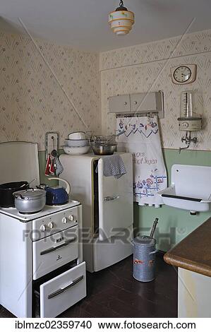 "Kitchen of the 1950s with a stove, a refrigerator, a sink and a hot water boiler, industrial museum, Lauf, Middle Franconia, Bavaria, Germany, Europe" View Large Photo Image Stock Image - "Kitchen of the 1950s with a stove, a refrigerator, a sink and a hot water boiler, industrial museum, Lauf, Middle Franconia, Bavaria, Germany, Europe". Fotosearch