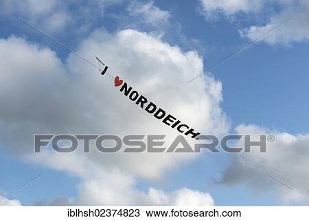"Kite, lettering """"I love Norddeich"""", Kite Festival, cloudy sky, Norden, Norddeich, East Frisia, Lower Saxony, Germany, Europe" View Large Photo Image Stock Image - "Kite, lettering """"I love Norddeich"""", Kite Festival, cloudy sky, Norden, Norddeich, East Frisia, Lower Saxony, Germany, Europe". Fotosearch