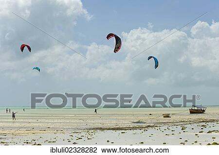 "Kite surfer in Paje, east coast of Zanzibar, Tanzania, Africa" View Large Photo Image Stock Image - "Kite surfer in Paje, east coast of Zanzibar, Tanzania, Africa". Fotosearch