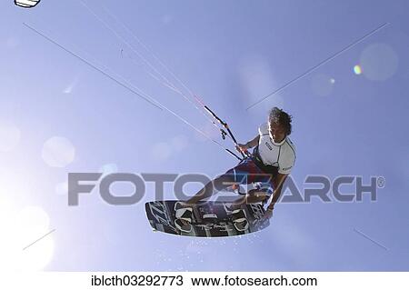 Stock Image - "Kitesurfer jumping, El Gouna, Red Sea Governorate, Egypt, Africa". Fotosearch