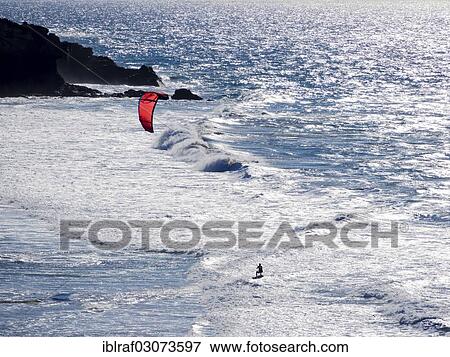 "Kitesurfer on the rocky west coast at La Pared, La Pared, Fuerteventura, Canary Islands, Spain, Europe" View Large Photo Image Stock Photo - "Kitesurfer on the rocky west coast at La Pared, La Pared, Fuerteventura, Canary Islands, Spain, Europe". Fotosearch