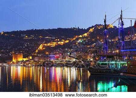 "Kizil Kule, Red Tower, and fortress walls of Alanya Castle with the harbour at front, Alanya, Turkish Riviera, Province of Antalya, Mediterranean Region, Turkey, Asia" View Large Photo Image Stock Photo - "Kizil Kule, Red Tower, and fortress walls of Alanya Castle with the harbour at front, Alanya, Turkish Riviera, Province of Antalya, Mediterranean Region, Turkey, Asia". Fotosearch