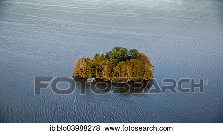 Stock Photo - "Kleine Muritz, bay in Muritz Lake, with a heart-shaped island and houseboat, Vipperow, Mecklenburg Lake District, Mecklenburg-Western Pomerania, Germany, Europe". Fotosearch