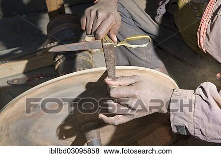 Stock Photo - "Knife grinder at work, Kathmandu Valley, Kathmandu, Kathmandu District, Bagmati Zone, Nepal, Asia". Fotosearch