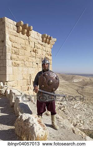 "Knight actor, defence tower with Arabic inscription, Montreal Crusader castle, also Mons Regalis, Shoubak or Shawbak, fortress, hill castle, Shoubak, built in 1115 by Baldwin I of Jerusalem, Idumea, Shoubak, Jordan, Asia" View Large Photo Image Stock Image - "Knight actor, defence tower with Arabic inscription, Montreal Crusader castle, also Mons Regalis, Shoubak or Shawbak, fortress, hill castle, Shoubak, built in 1115 by Baldwin I of Jerusalem, Idumea, Shoubak, Jordan, Asia". Fotosearch