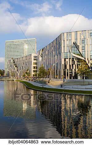 "Ko-Bogen complex of buildings with offices, shops and restaurants, Konigsallee, city centre, Dusseldorf, North Rhine-Westphalia, Germany, Europe" View Large Photo Image Stock Image - "Ko-Bogen complex of buildings with offices, shops and restaurants, Konigsallee, city centre, Dusseldorf, North Rhine-Westphalia, Germany, Europe". Fotosearch