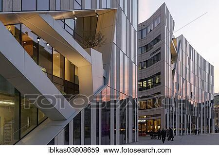 "Ko-Bogen, new commercial building and office building on Konigsallee, architect Daniel Libeskind, Dusseldorf, North Rhine-Westphalia, Germany, Europe" View Large Photo Image Stock Photo - "Ko-Bogen, new commercial building and office building on Konigsallee, architect Daniel Libeskind, Dusseldorf, North Rhine-Westphalia, Germany, Europe". Fotosearch