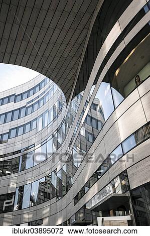 "Ko-Bogen retail complex by architect Daniel Libeskind, office buildings and shops, Dusseldorf, North Rhine-Westphalia, Germany, Europe" View Large Photo Image Stock Image - "Ko-Bogen retail complex by architect Daniel Libeskind, office buildings and shops, Dusseldorf, North Rhine-Westphalia, Germany, Europe". Fotosearch