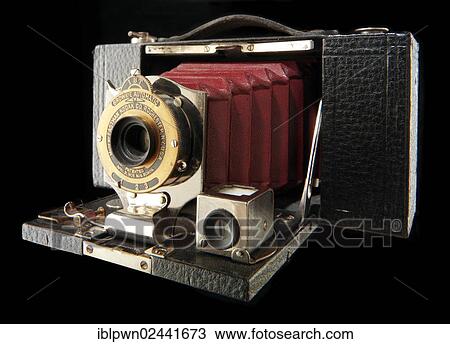 Stock Image - "Kodak Eastman Brownie Automatic with red bellows camera, No 2 Pocket Folding". Fotosearch
