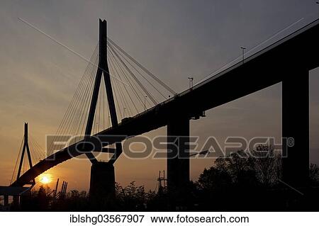 "Koehlbrandbruecke bridge at sunset, Neuhof, Hamburg, Hamburg, Germany, Europe" View Large Photo Image Stock Photo - "Koehlbrandbruecke bridge at sunset, Neuhof, Hamburg, Hamburg, Germany, Europe". Fotosearch