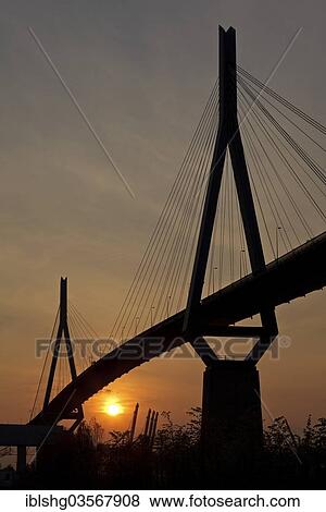 "Koehlbrandbruecke bridge at sunset, Neuhof, Hamburg, Hamburg, Germany, Europe" View Large Photo Image Stock Photo - "Koehlbrandbruecke bridge at sunset, Neuhof, Hamburg, Hamburg, Germany, Europe". Fotosearch