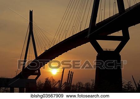 "Koehlbrandbruecke bridge at sunset, Neuhof, Hamburg, Hamburg, Germany, Europe" View Large Photo Image Stock Photo - "Koehlbrandbruecke bridge at sunset, Neuhof, Hamburg, Hamburg, Germany, Europe". Fotosearch