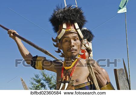 Picture - "Konyak warrior in full gear at Hornbill Festival, Kohima, India, Asia". Fotosearch