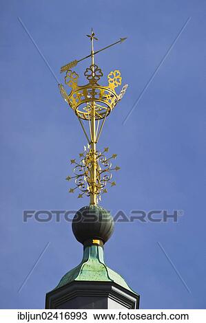 Kroenchen sculpture on the steepletop of Nikolaikirche Church, landmark of Siegen, Siegen, Siegen-Wittgenstein district, North Rhine-Westphalia, Germany, Europe View Large Photo Image Stock Image - Kroenchen sculpture on the steepletop of Nikolaikirche Church, landmark of Siegen, Siegen, Siegen-Wittgenstein district, North Rhine-Westphalia, Germany, Europe. Fotosearch