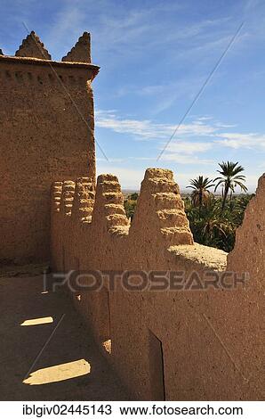 Stock Image - "Ksar, adobe architecture, Draa Valley, Morocco, Africa". Fotosearch