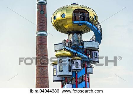"Kuchlbauer Tower, also Hundertwasser Tower by Friedensreich Hundertwasser and Peter Pelican in the beer garden of the Kuchlbauer Brewery, with the chimney of the brewery, Kuchlbauer's World of Beer, Abensberg, Lower Bavaria, Bavaria, Germany, Europe" View Large Photo Image Stock Photograph - "Kuchlbauer Tower, also Hundertwasser Tower by Friedensreich Hundertwasser and Peter Pelican in the beer garden of the Kuchlbauer Brewery, with the chimney of the brewery, Kuchlbauer's World of Beer, Abensberg, Lower Bavaria, Bavaria, Germany, Europe". Fotosearch
