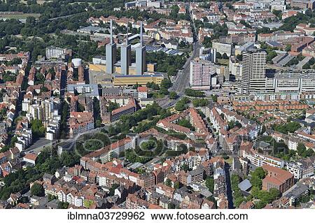"Kuechengarten square, centre, power plant on the left, Ihme-Zentrum residential, business and shopping centre on the right, aerial view, Linden, Hannover, Lower Saxony, Germany, Europe" View Large Photo Image Stock Image - "Kuechengarten square, centre, power plant on the left, Ihme-Zentrum residential, business and shopping centre on the right, aerial view, Linden, Hannover, Lower Saxony, Germany, Europe". Fotosearch