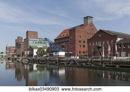 "Kueppersmuehle and Werhahnmuehle, row of historical warehouse buildings, Innenhafen, Duisburg, Ruhr district, North Rhine-Westphalia, Germany, Europe" View Large Photo Image Stock Image - "Kueppersmuehle and Werhahnmuehle, row of historical warehouse buildings, Innenhafen, Duisburg, Ruhr district, North Rhine-Westphalia, Germany, Europe". Fotosearch