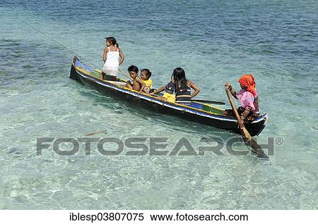 "Kuna Indians in a dugout canoe, Nalunega, San Blas Islands, Caribbean, Panama, North America" View Large Photo Image Stock Photography - "Kuna Indians in a dugout canoe, Nalunega, San Blas Islands, Caribbean, Panama, North America". Fotosearch