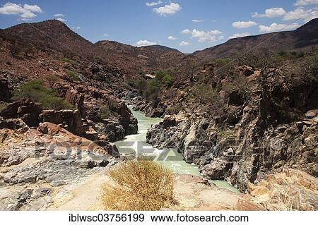 "Kunene River directly on the border between Namibia and Angola, Epupa, Kaokoland, Kunene, Namibia, Africa" View Large Photo Image Stock Photo - "Kunene River directly on the border between Namibia and Angola, Epupa, Kaokoland, Kunene, Namibia, Africa". Fotosearch
