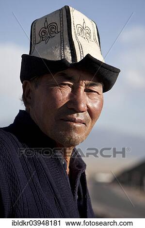Stock Image - "Kyrgyz man, portrait, Sary-Tash, Osh, Kyrgyzstan, Asia". Fotosearch