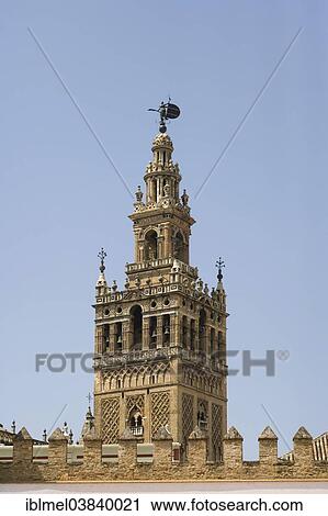 Stock Image - "La Giralda, Seville Cathedral, Plaza Patio de Banderas, Alcazar of Sevilla, Barrio de Santa Cruz, Seville, Andalusia, Spain, Europe". Fotosearch