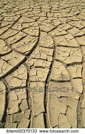 "Lack of water, mud cracks in a dried up water hole, Painted Desert, Hopi Reservation, Navajo Nation Reservation, Arizona, Southwest, United States of America, USA" View Large Photo Image Stock Image - "Lack of water, mud cracks in a dried up water hole, Painted Desert, Hopi Reservation, Navajo Nation Reservation, Arizona, Southwest, United States of America, USA". Fotosearch